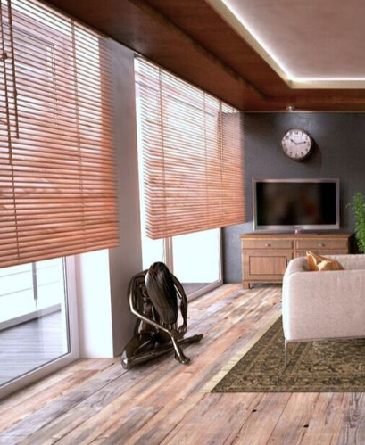 Thin brown window blinds installed along large windows in a living space of a home.